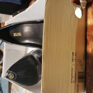 Brand- Michael Kors Size- 7.5 Color- Black